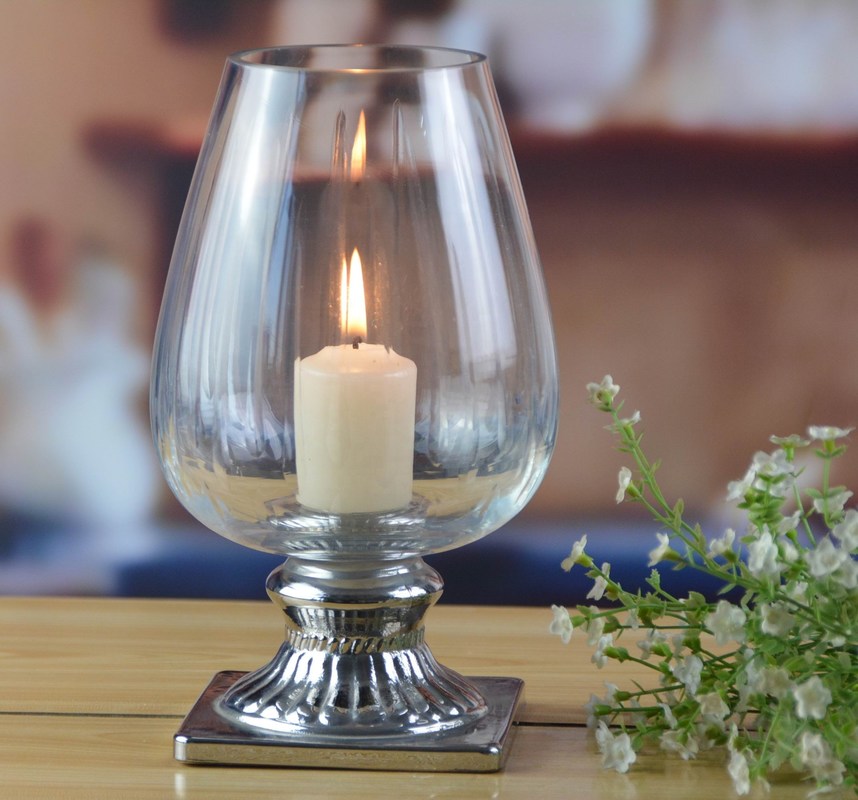 kualitas Handmade Ancient Pillar Candle Holders With Silver Foot pabrik