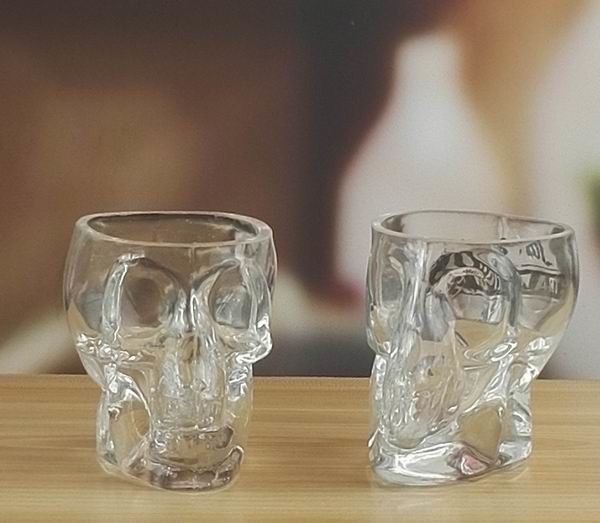 kualitas Machine Made Embossed Skull 1.5 Oz Shot Glasses pabrik
