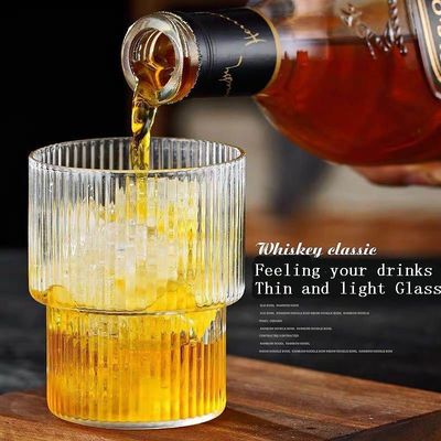 kualitas Thin Wall 7cm Diameter Tumbler Drinking Glasses With Optical Stripes pabrik