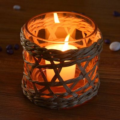 kualitas Round Creative Glass Candle Holders With Wicker Sleeve pabrik