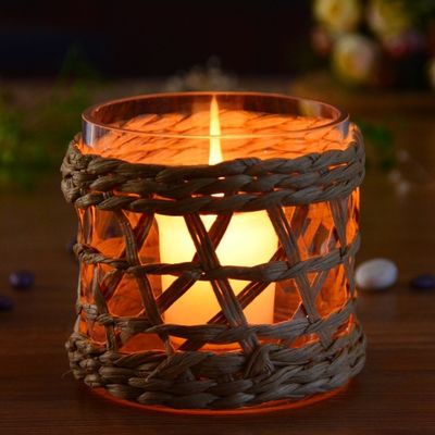 kualitas Round Creative Glass Candle Holders With Wicker Sleeve pabrik