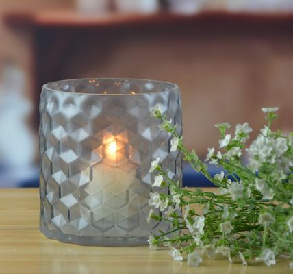 kualitas 8" Grey Embossed Fence Pattern Glass Candle Holders pabrik