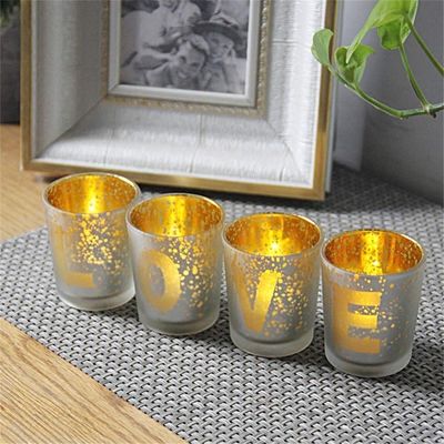 kualitas Electroplated Matte Glass Candle Holders With Morden Pattern pabrik