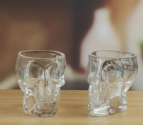 kualitas Machine Made Embossed Skull 1.5 Oz Shot Glasses pabrik
